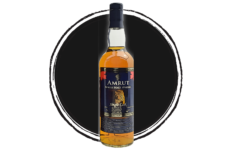 Amrut single malt whisky bottle.