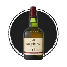 Redbreast 12 Irish Whiskey bottle on black background.