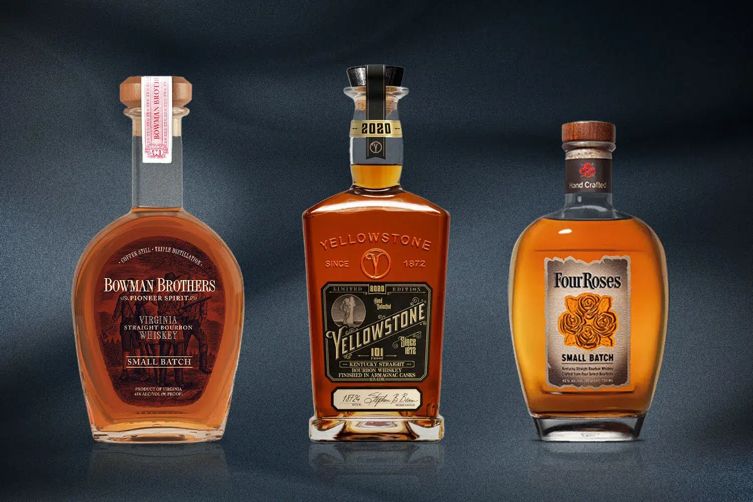 Three varieties of bourbon whiskey bottles on display.