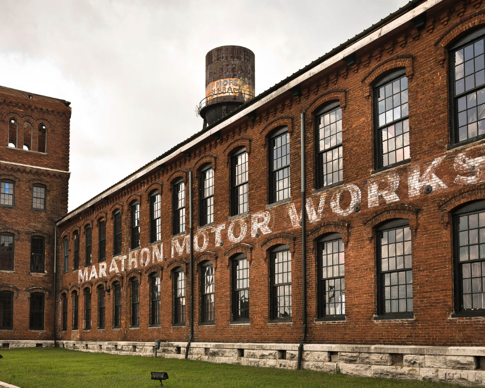 Historic Marathon Motor Works building with water tower.