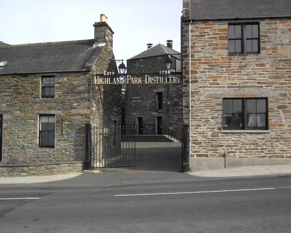 Highland Park Distillery entrance with stone buildings.