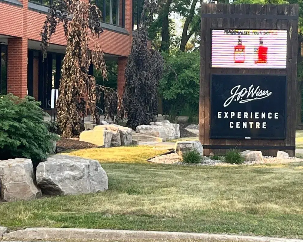 J.P. Wiser's Experience Centre sign with landscaping.