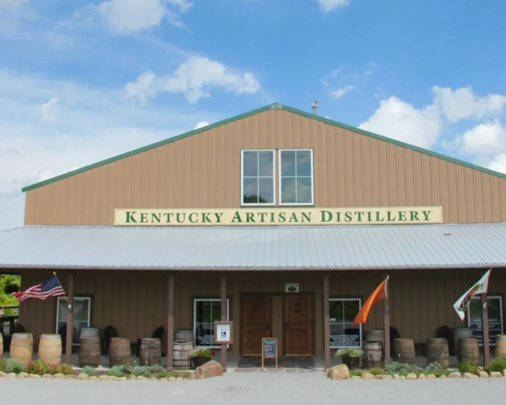 Kentucky Artisan Distillery exterior with American flag.