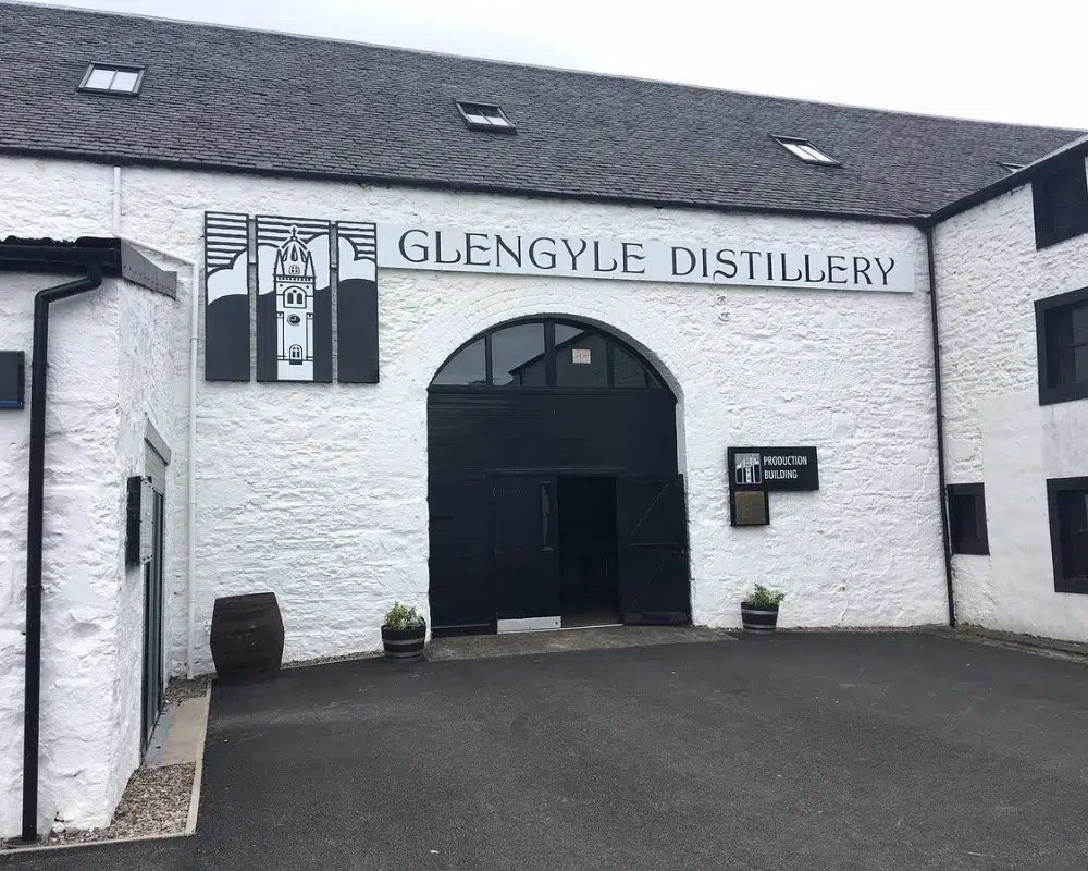 Glengyle Distillery exterior with signage and entrance.