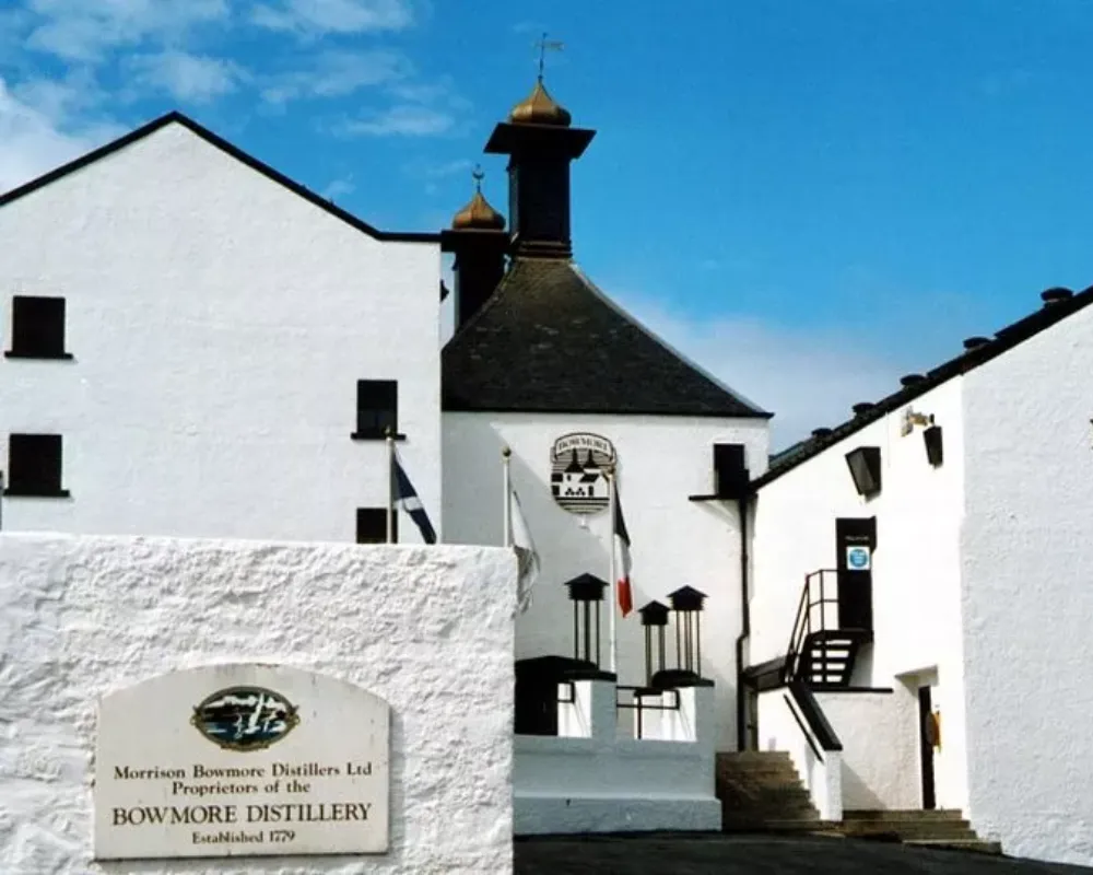 Bowmore Distillery white buildings, Scotland, established 1779.