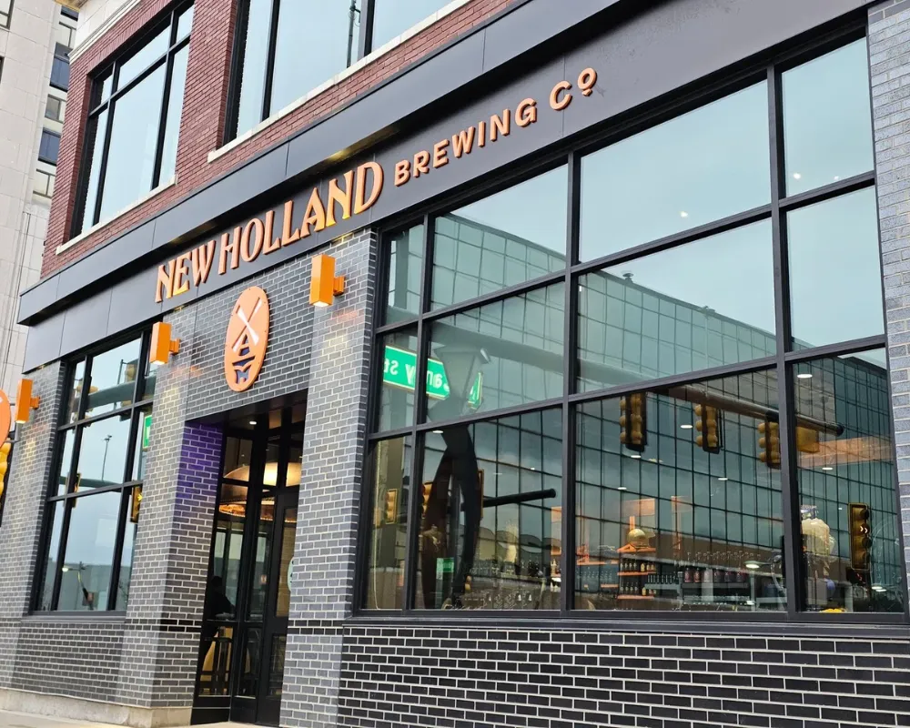 New Holland Brewery exterior with logo and windows.