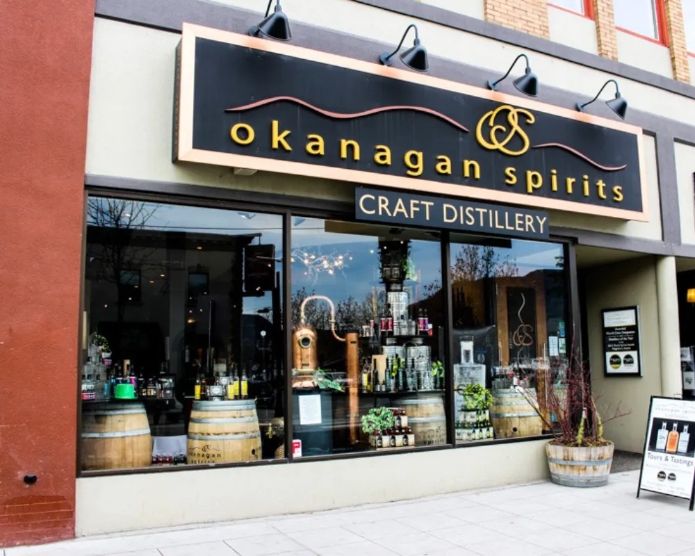 Okanagan Spirits Craft Distillery storefront with barrels.