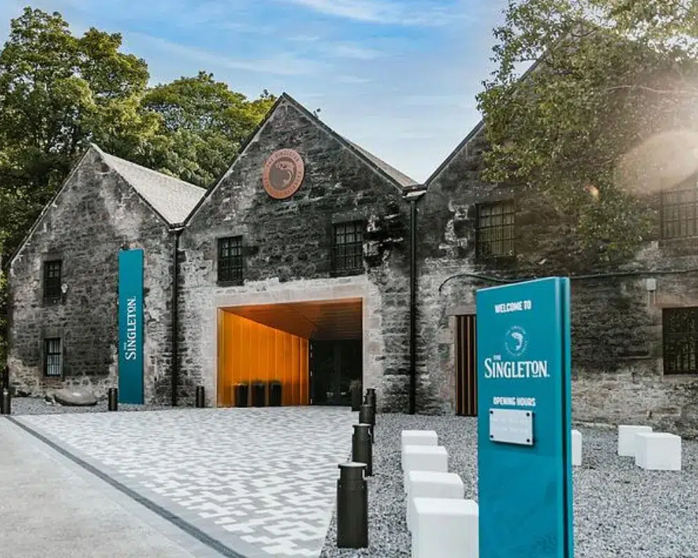 Historic Singleton distillery entrance with welcome sign.