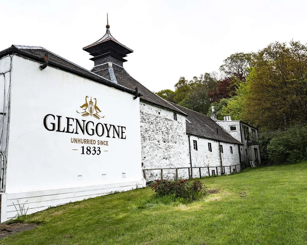 Glengoyne whisky distillery exterior with logo, Scotland.