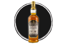 Amrut Kadhambam Indian single malt whisky bottle.