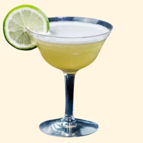 Cocktail with lime slice garnish