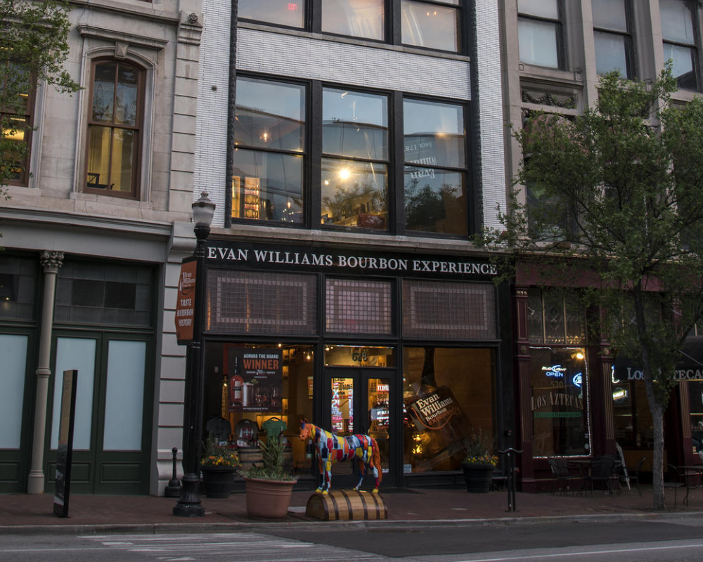 Evan Williams Bourbon Experience entrance on a city street.