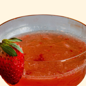 Strawberry cocktail with a fresh strawberry garnish.