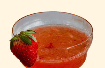 Strawberry cocktail with a fresh strawberry garnish.