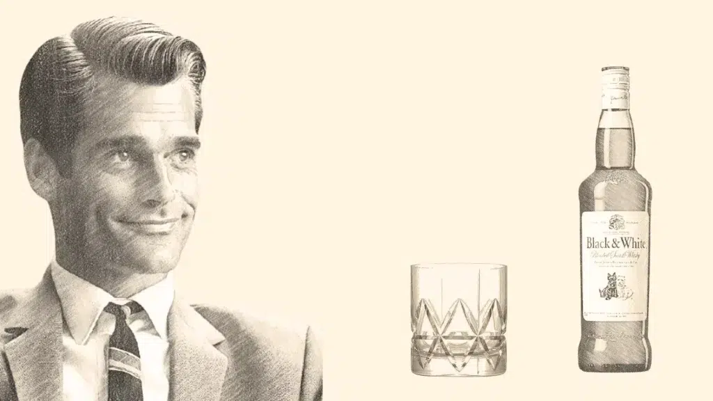 Vintage man with whiskey bottle and glass.