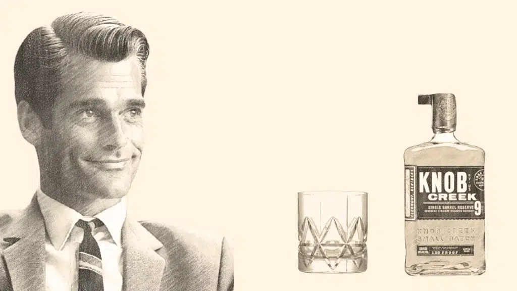 Smiling man with whiskey glass and bottle